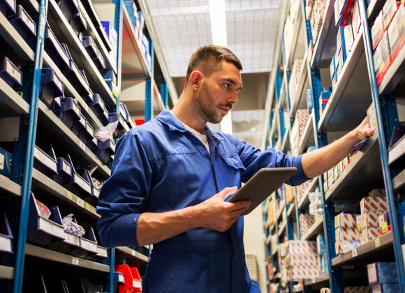 A worker is checking inventory