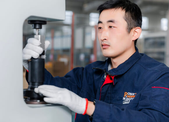 Worker is checking the component