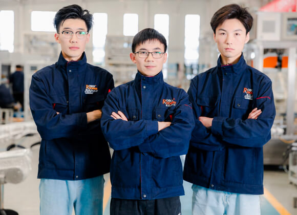 3 men are staring with arms crossed