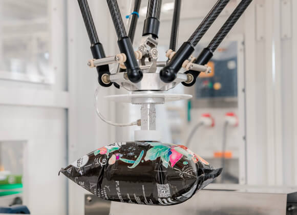 Robot is handling a bag of chips